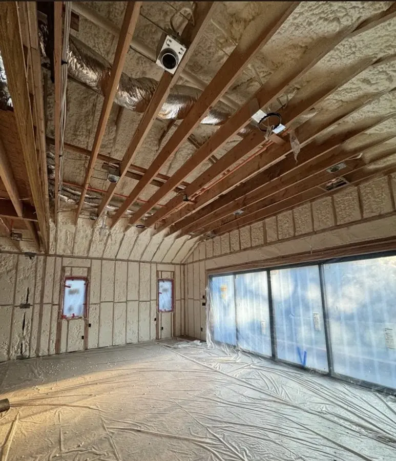 Interior walls and ceiling insulated with spray foam during new construction in Hillsboro